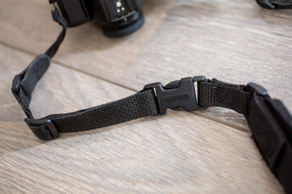 Simple buckles for attaching the shoulder pad. 