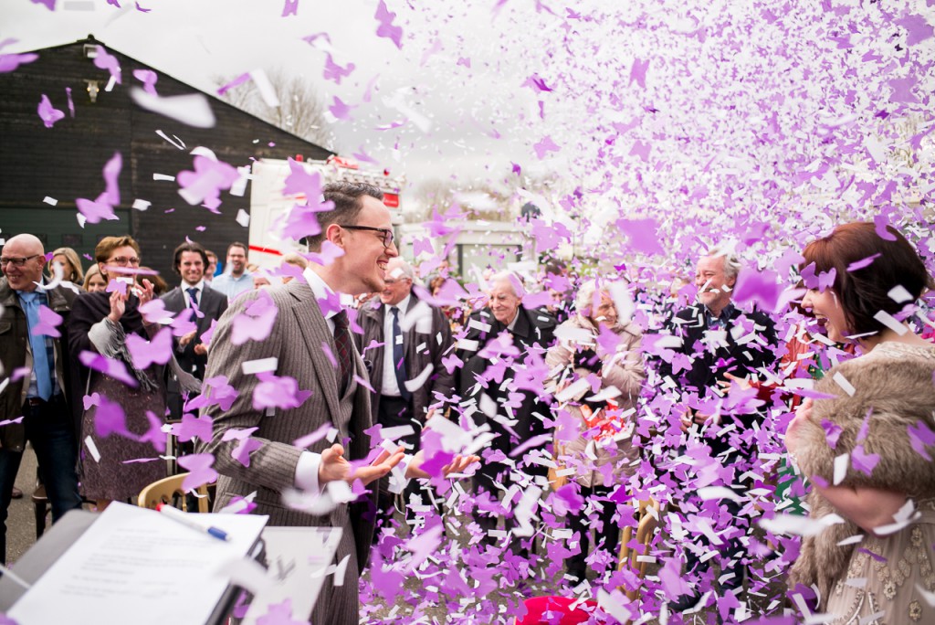 An action, in the middle of it. I found colored paper in my photo bag weeks after this wedding.