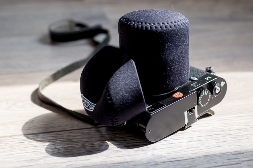 Sliding the pouch on is as easy as putting the lens cap on...