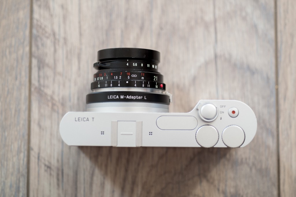 Here's the T with the smallest M lens, the CV/21/4, attached with the original Leica adapter.